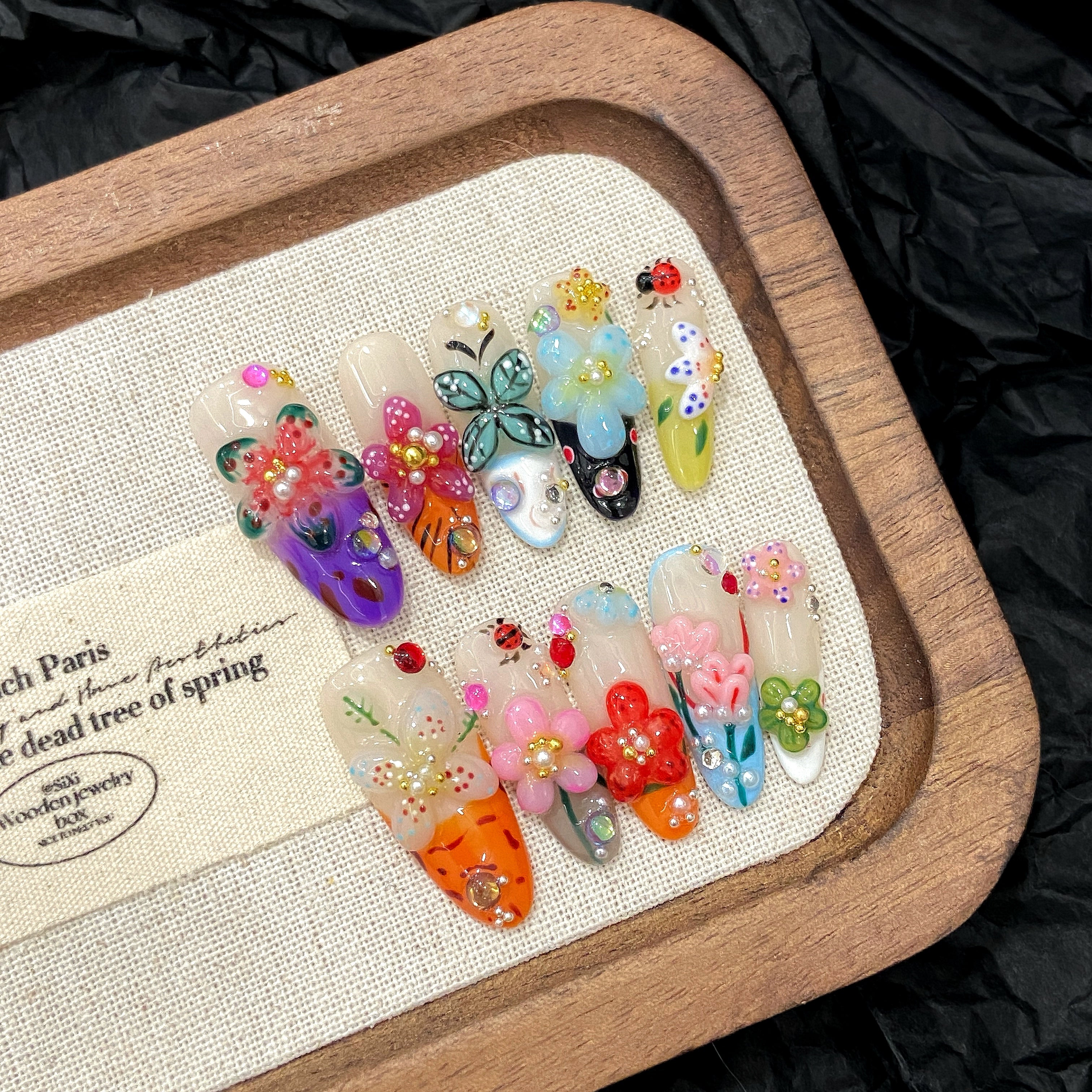Summer floral nail art with almond-shaped nails
