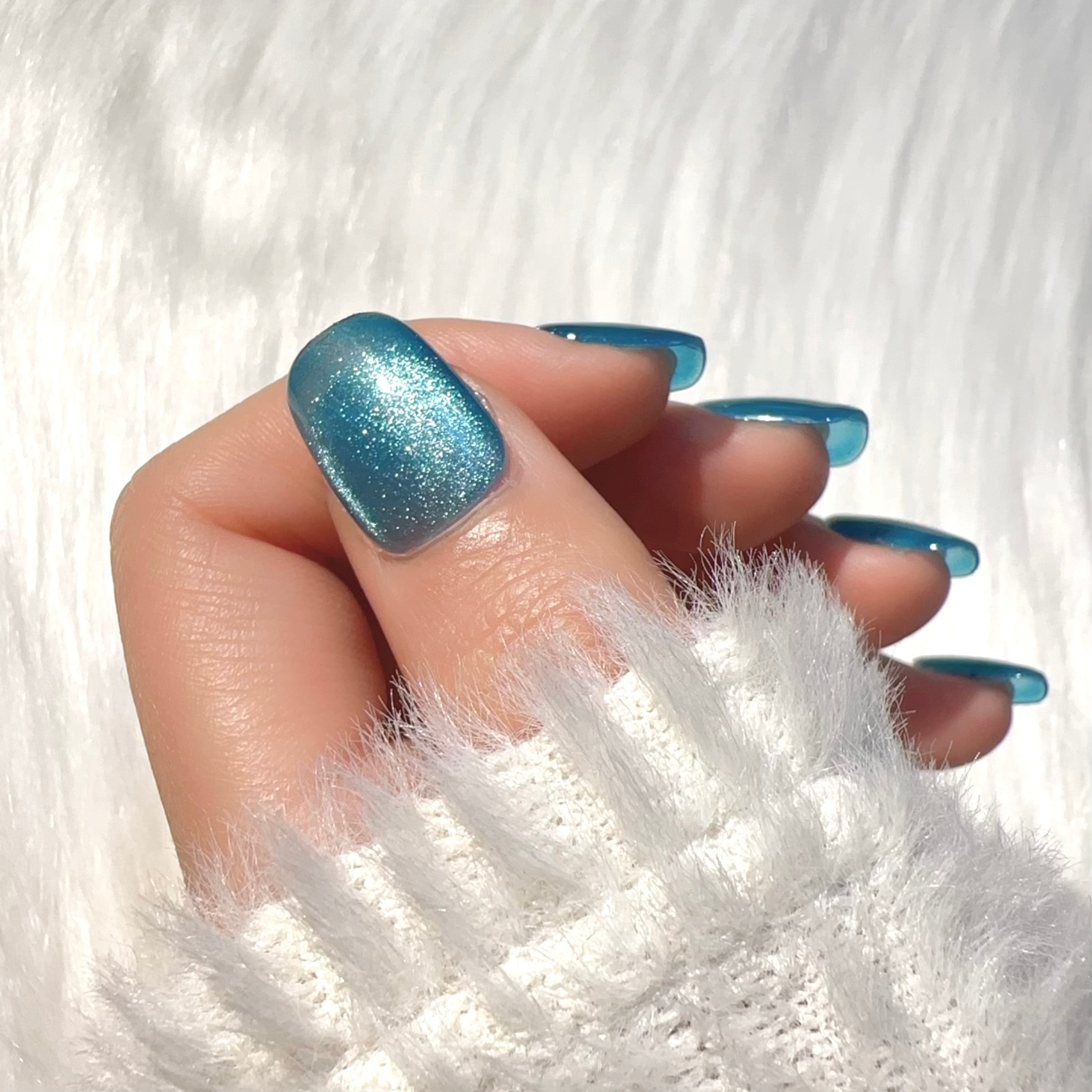 Teal - glittery - daily - wear false nails.